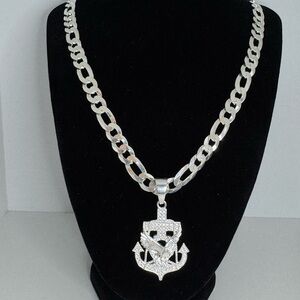 Cadena Figaro con dije de águila en cruz de ancla plata 925